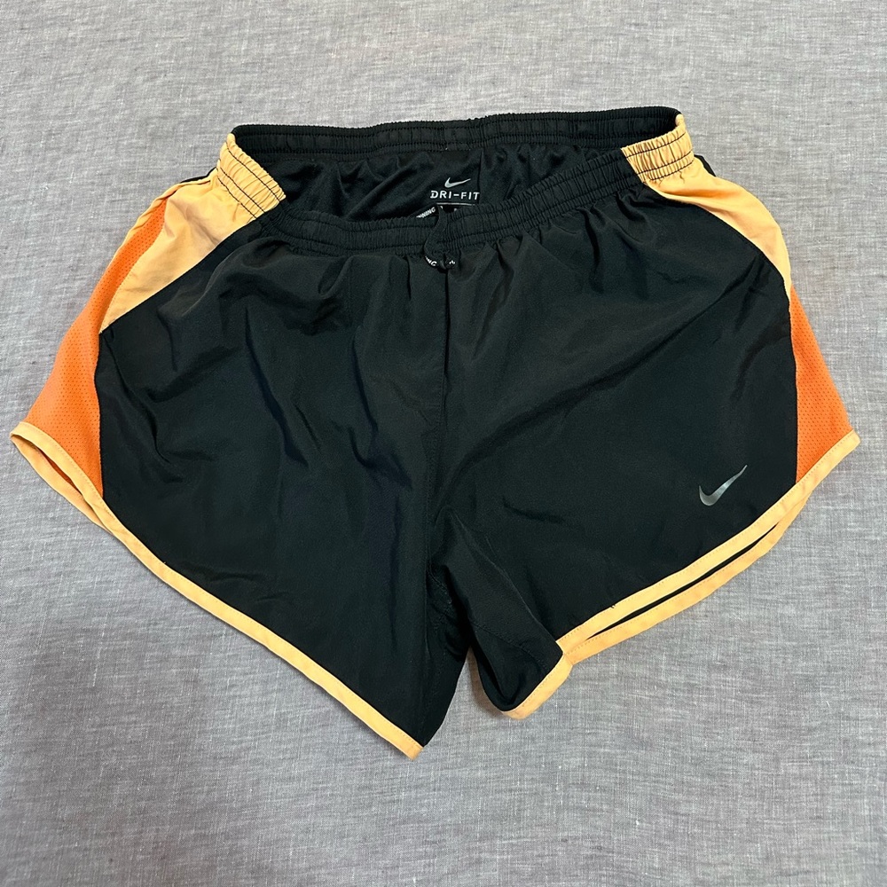 Nike black and orange athletic shorts